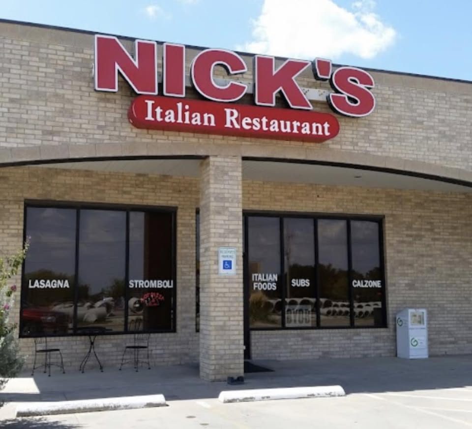 The storefront of Nick's Italian Restaurant on US 377 in Pilot Point, Texas